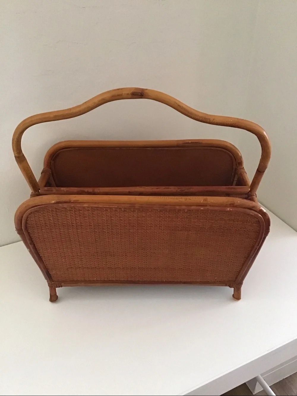 Vintage 1950s magazine rack bent bamboo frame, woven rattan side